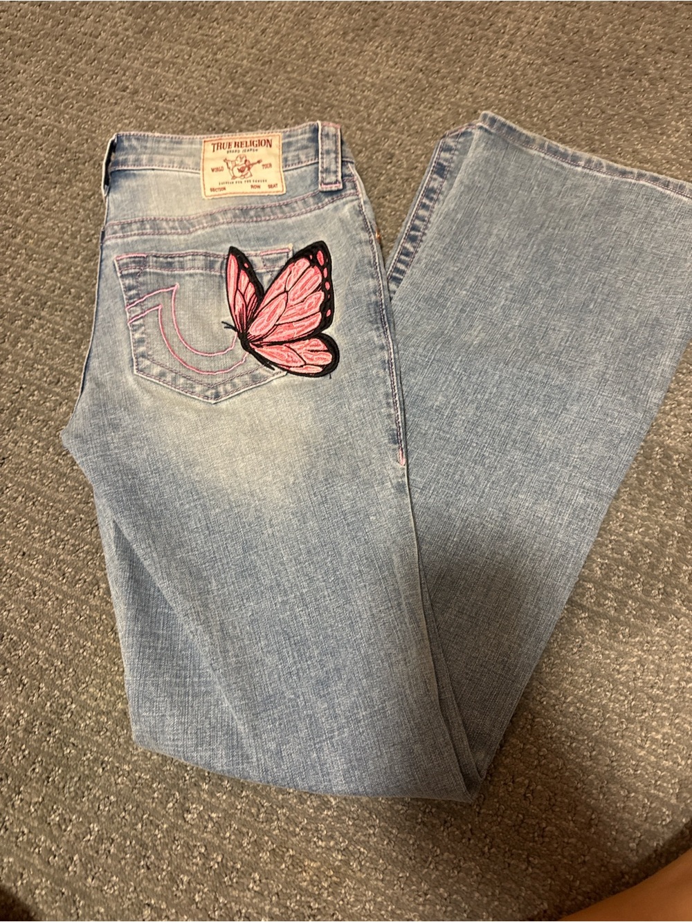 True Religion Women's Light Wash Jeans with Pink Butterfly Patches